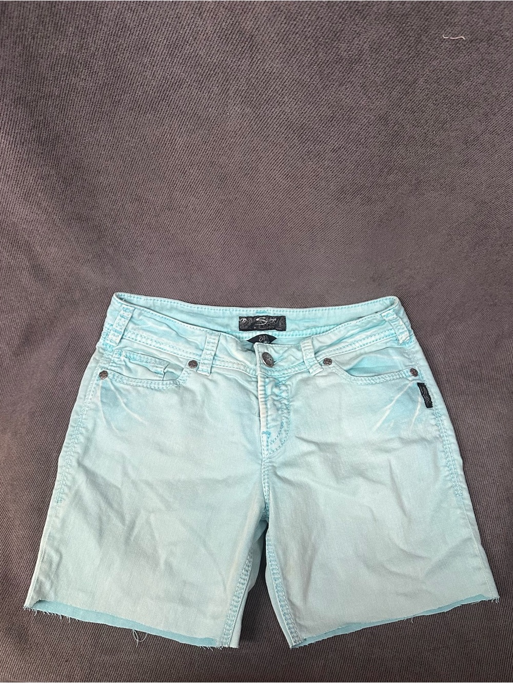 Silver jeans Suki shorts turquoise cut off midrise 29”